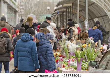 VOLGOGRAD - MARCH 8: The high demand for flowers in connection with international women\'s day on the streets. March 8, 2015 in Volgograd, Russia.