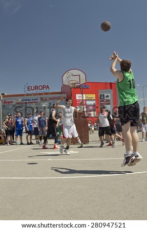 VOLGOGRAD, RUSSIA - MAY 24: Unidentified teens play streetball on open area located next to 