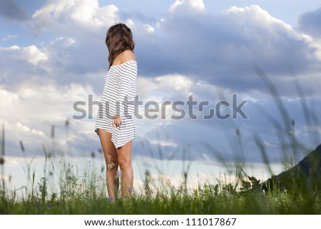 woman looking back over her shoulder