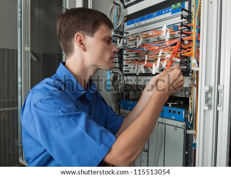 Network engineer in server room