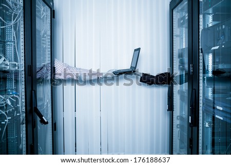 server room and data center, Network Engineer transmits laptop