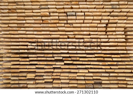 Wooden board for terrace, stacked at construction site