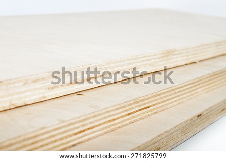 three light plywood boards stacked