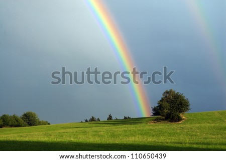 beautiful rainbow during a summer storm