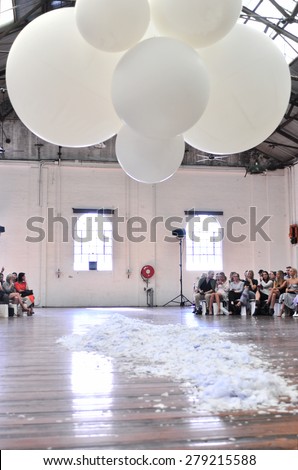 SYDNEY AUSTRALIA - 15 APRIL 2015: Preparation of runway stage behind the scene ahead of start of Jennifer Kate backstage fashion show at Mercedes Benz Fashion Week in Carriageworks Sydney Australia.