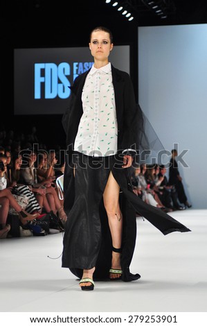 SYDNEY AUSTRALIA - 15 APRIL 2015: Mat Lee clothes collection fashion show runway presented by the Innovators Fashion Design Studio at Mercedes Benz Fashion Week at Carriageworks.