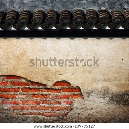 cracked concrete vintage brick wall background with china roof