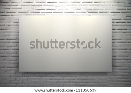 Blank white frame on white brick wall background with spot lights in museum
