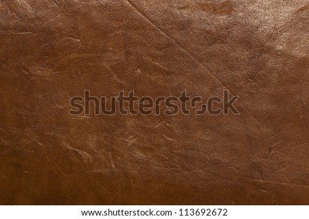 Old brown leather book texture closeup photo