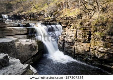 Kisdon Force is a series of waterfalls on the River Swale in Swaledale, England. The falls are situated within the Yorkshire Dales National Park in the county of North Yorkshire.