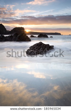 Kynance Cove is a cove in southwest Cornwall, United Kingdom being situated on the Lizard peninsula approximately two miles north of Lizard Point. Kynance Cove is owned by the National Trust.