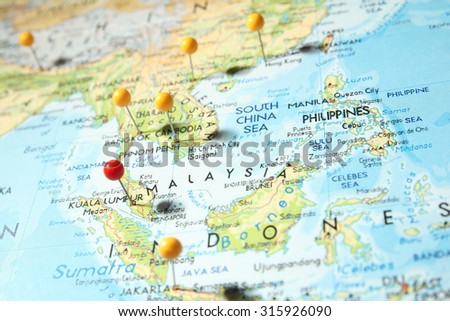 Pins on map with focus on Kuala Lumpur city, Malaysia