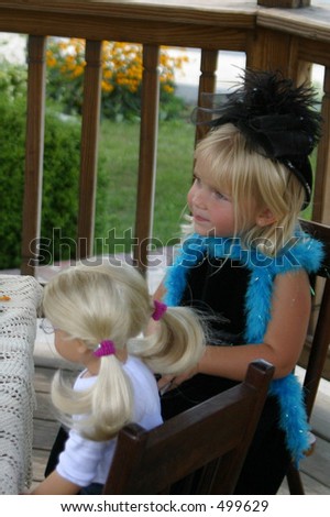 Tea party for young girl, with rabbits and stuffed animals