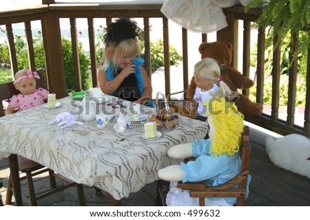 Tea party for young girl, with rabbits and stuffed animals