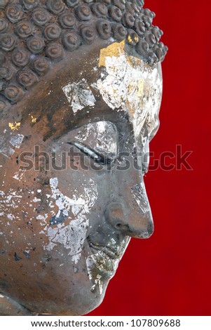 Ancient Buddha face, Ayutthaya, Thailand.