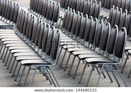 Rows of chairs in the meeting room.