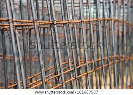 steel bars construction materials, in a construction site.