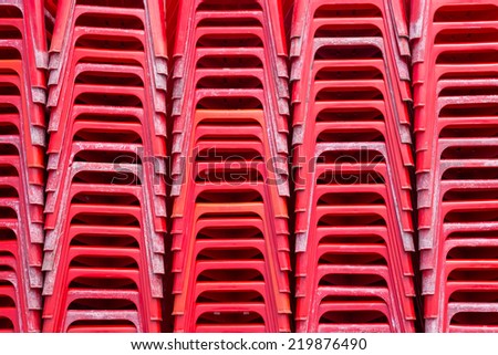 Rows of chairs stacked.