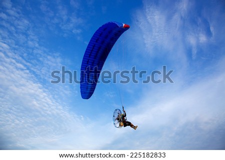 Para-motor flying in the sky