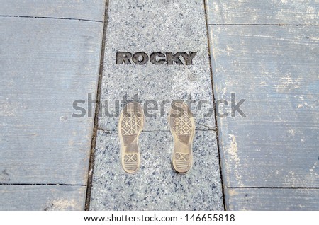 PHILADELPHIA - CIRCA MAY 2013: The Rocky Steps in Philadelphia, USA, circa May 2013. The bronze inlay of sneaker footprints with the name \