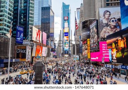 NEW YORK CIRCA MAY 2013 Times Square New York circa May 2013 It's a major commercial intersection iconified as The Crossroads of the World it's also the hub of the Broadway Theater District NEW YORK CIRCA MAY 2013 Times Square New York circa May 2013 It's a major commercial intersection iconified as The Crossroads of the World it's also the hub of the Broadway Theater District