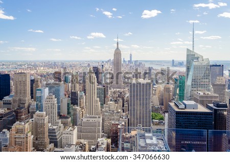 NEW YORK - CIRCA MAY 2013: The New York Skyline dominated by the Empire State Building, circa May 2013. The Empire S.B. is one of the main landmarks and American cultural icons in New York