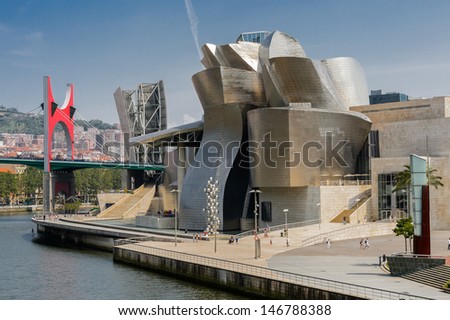 Bilbao, Spain - July 19: Exterior Of The Guggenheim Museum On July 19, 2013 In Bilbao, Spain. The Guggenheim Is A Museum Of Modern And Contemporary Art Designed By Frank Gehry