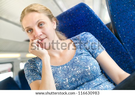 women think about something in a train