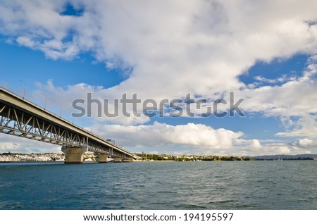 Auckland Harbor Bridge/ Auckland's iconic harbor bridge with the city in the background