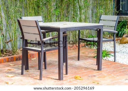 Garden patio with table and chairs