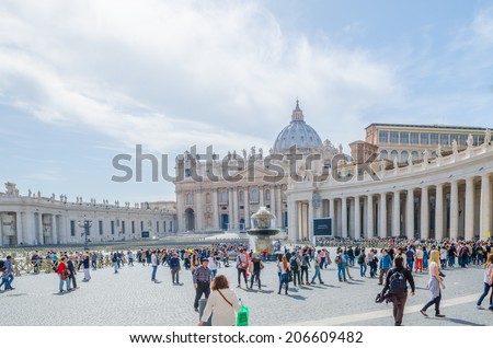VATICAN CITY - April 3:VATICAN in on April 3, 2014 Rome, Italy.  Tourists visiting Saint Peters Church Square. Basilica San Pietro Piazza.