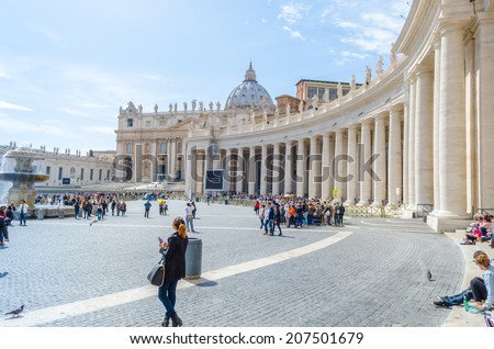 VATICAN CITY - April 3:VATICAN in on April 3, 2014 Rome, Italy.  Tourists visiting Saint Peters Church Square. Basilica San Pietro Piazza.