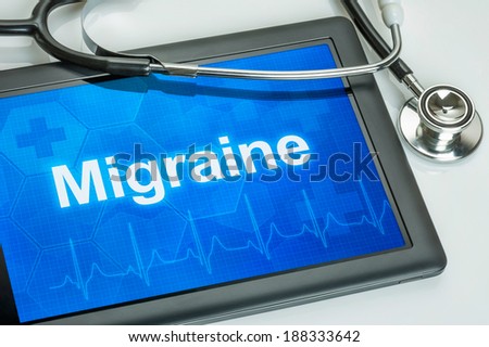 Tablet with the diagnosis migraine on the display