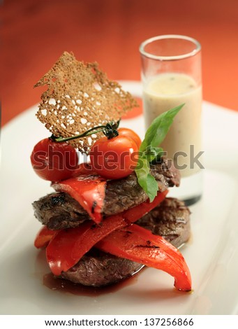 Angus beef steak with  grilled vegetables and sauce