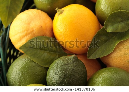 Basket of lemons and limes background