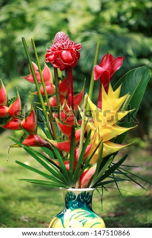 Bouquet of exotic tropical flowers in a vase