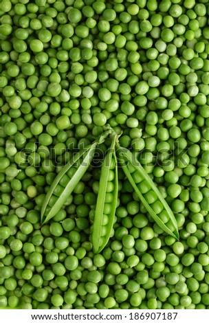 Green pea pods on green peas background