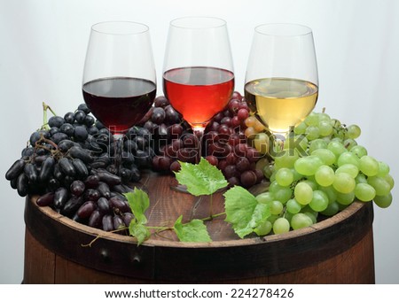 Red wine glass, white wine glass, rose wine glass and red wine and white wine  grapes