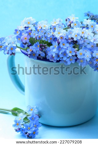 Forget-me-nots posy in a blue vase