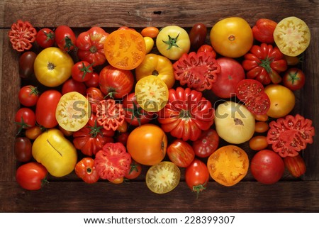 Beefsteak tomatoes and cherry tomatoes  background
