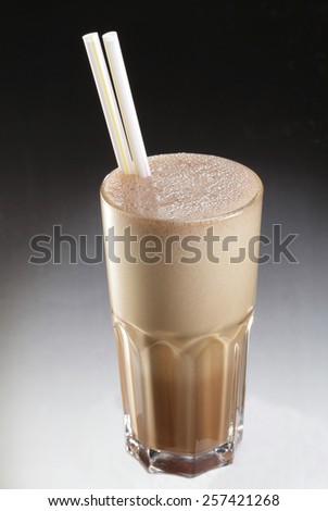 Glass of chocolate drink/ coffee drink isolated on white background