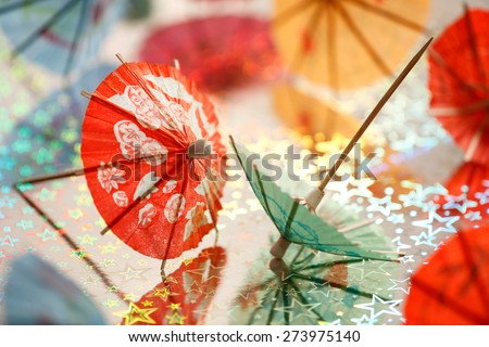 Cocktail umbrellas background