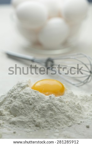 Making dough with Fresh hen\'s eggs from the farm  and flour