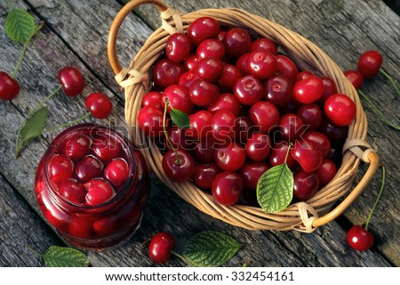 Cherry jam/ cherry  basket /  fresh cherries  background/  top view