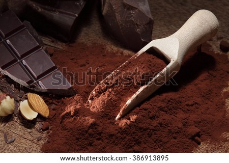 Chocolate / chocolate bar pieces / cocoa powder / chocolate background