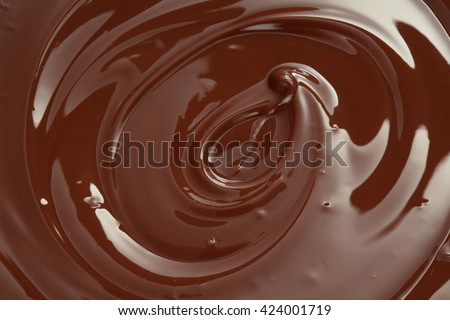 Melted chocolate swirl with a hazelnut/ melting chocolate/ chocolate swirl