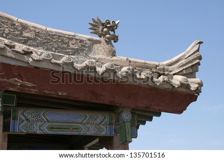 roof detail architecture at ancient silk road fort jia yu guan chinese great wall , rammed earth construction, near dunhuang and gobi desert gansu province china