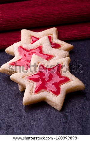 christmas star cookies with red jelly