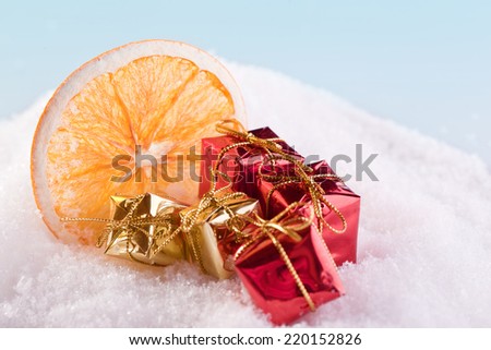 orange fruit and red gift box