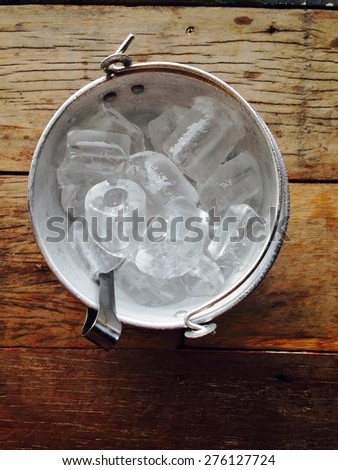 Ice bucket on wood table